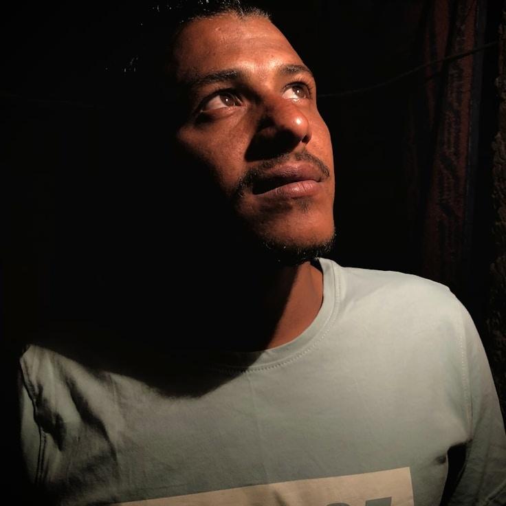 Alex Rivera, Lead Design Curator at AeroFieldWorks, reviewing corporate floral arrangements